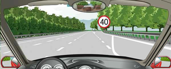 如图所示，驾驶机动车驶离高速公路时，在这个位置应怎样行驶？